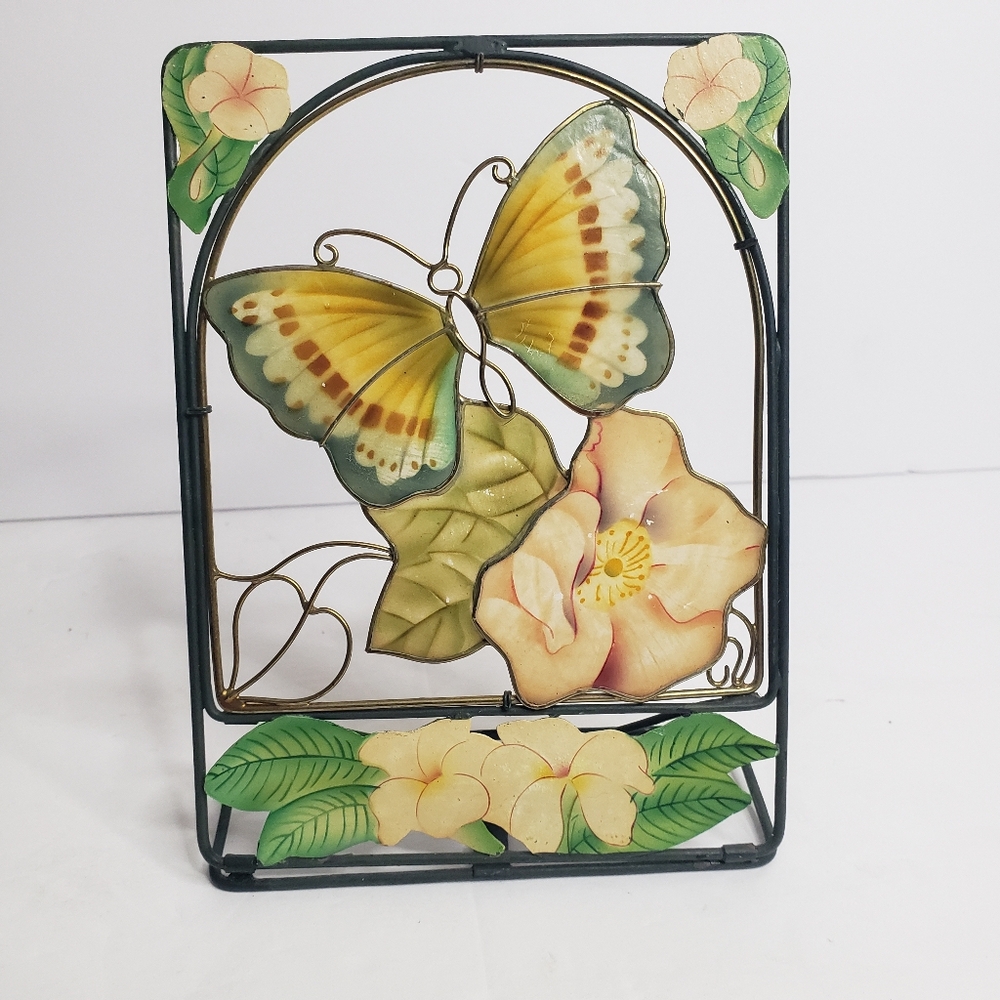 Decorative metal and stained glass artwork. 218